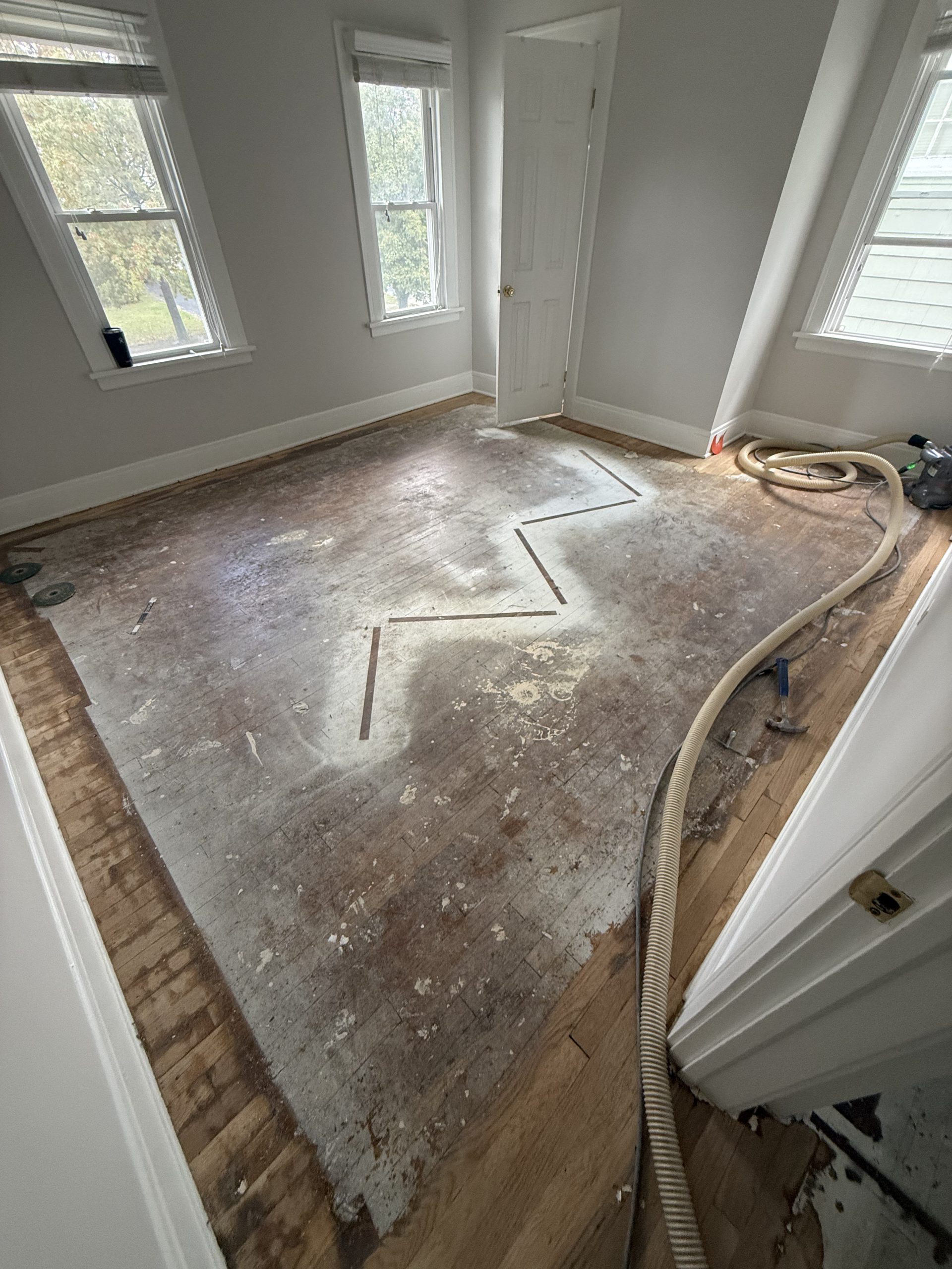 View of White Oak Refinish Before and After - Cleveland Hardwood Restoration