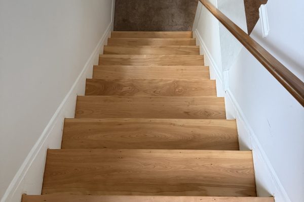 photo shows a refinished hardwood floor in cleveland, ohio -- it's an oak floor in an older home that was completely sanded and finished by cleveland hardwood restoration.