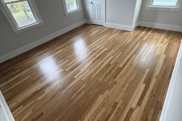 photo shows a refinished hardwood floor in cleveland, ohio -- it's an oak floor in an older home that was completely sanded and finished by cleveland hardwood restoration.